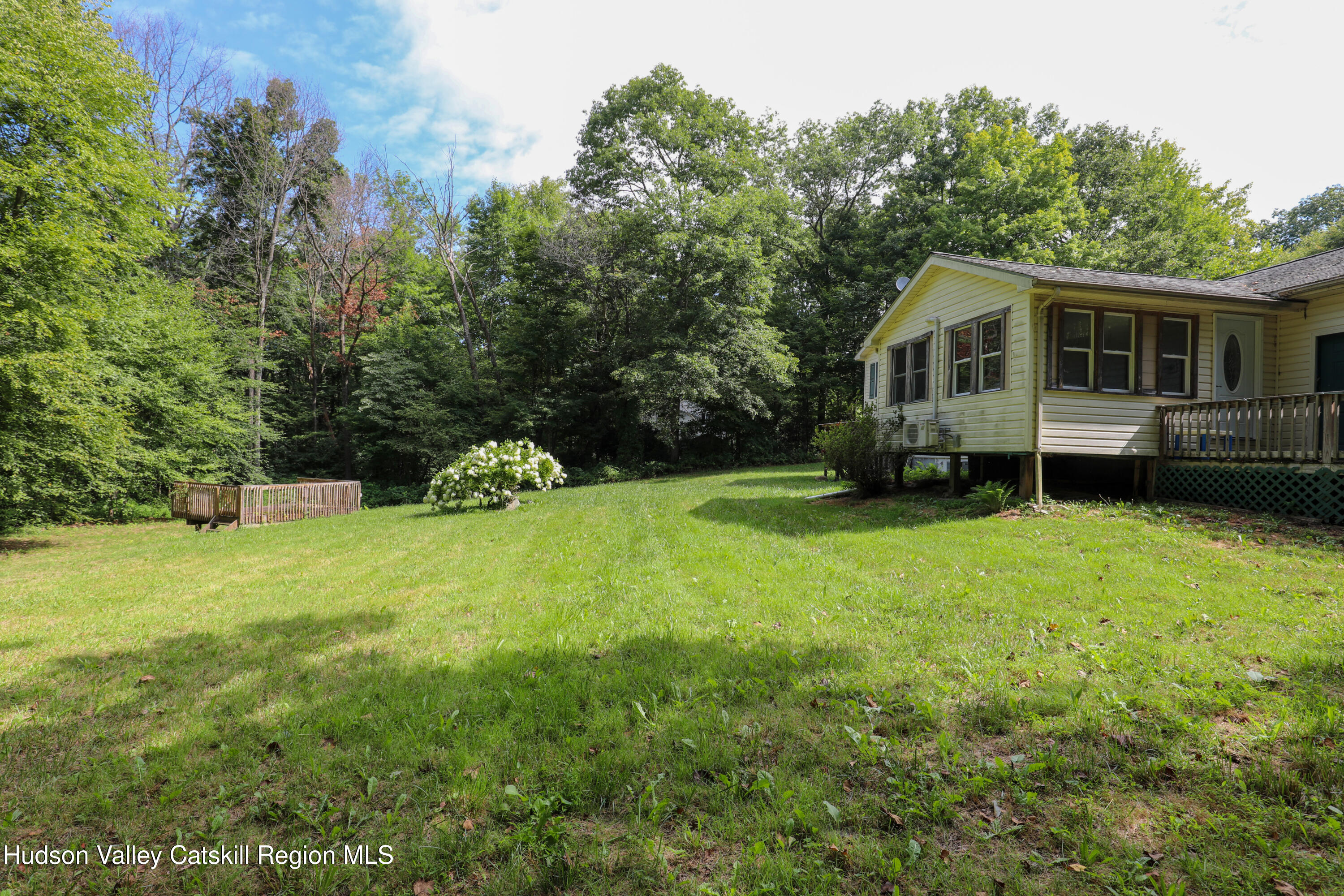 38 Roxanne Boulevard Highland, NY 12528 - Photo 40 of 42 a front view of a house with a garden