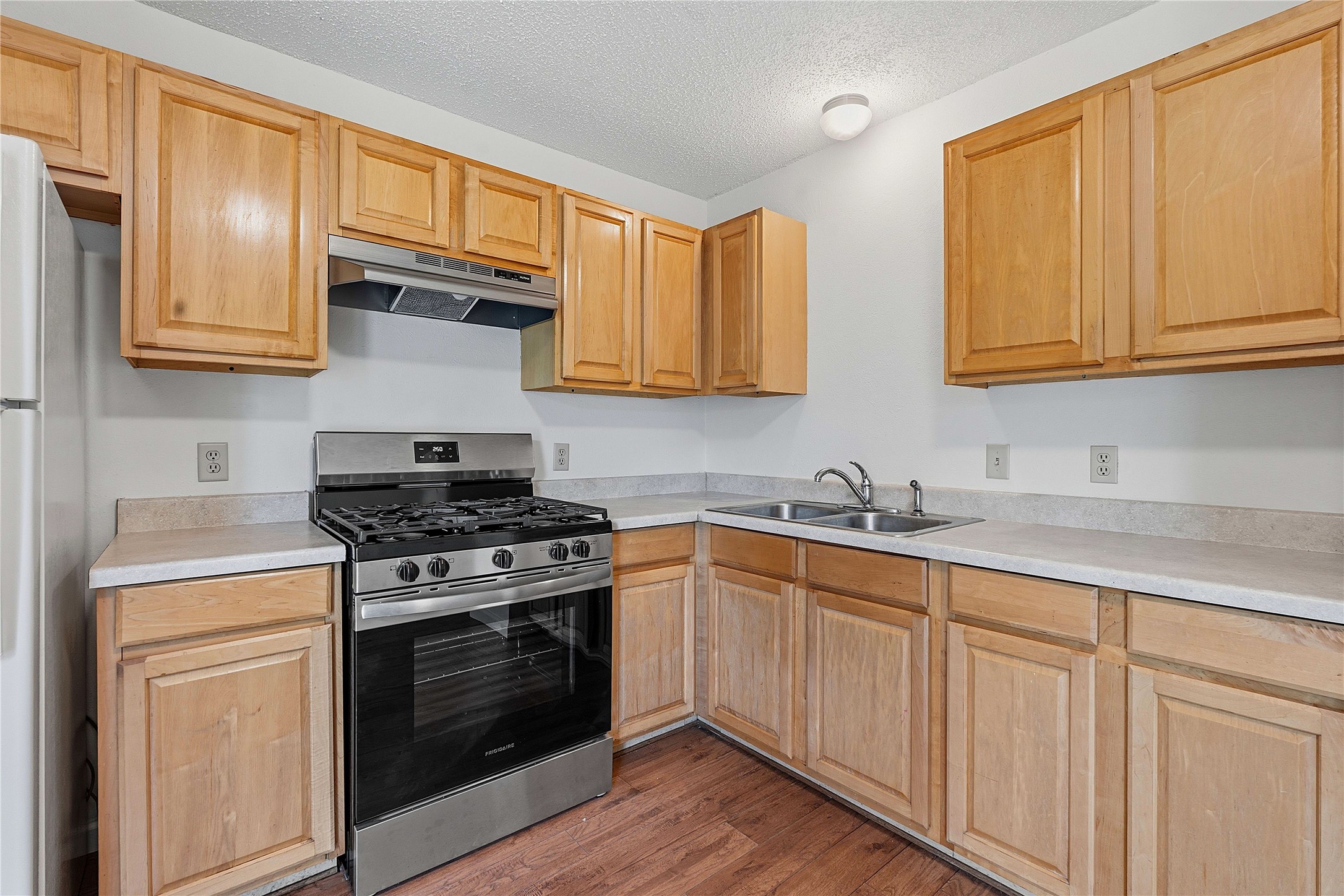6205 Shadow Bend Austin, TX 78745 - Photo 2 of 31 A well-equipped culinary space awaits your personal touch with ample cabinetry and modern appliances.