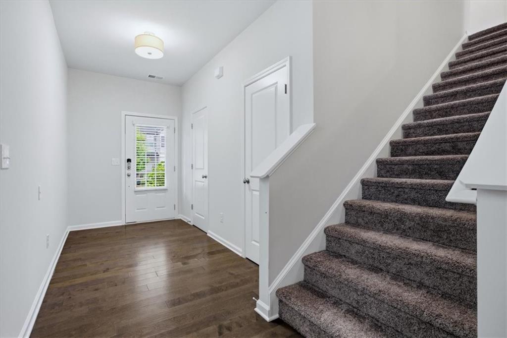 585 Summit Point Canton, GA 30114 - Photo 5 of 30 a view of entryway with wooden floor