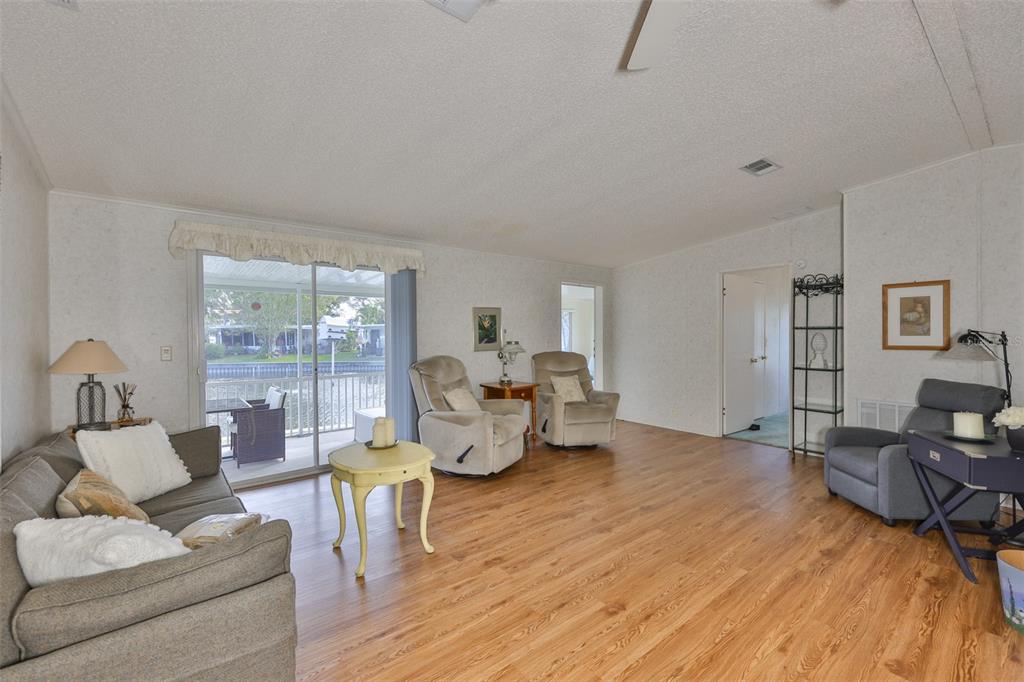 980 7th Street Northwest, Unit 16 Largo, FL 33770 - Photo 15 of 35 a living room with furniture and a large window
