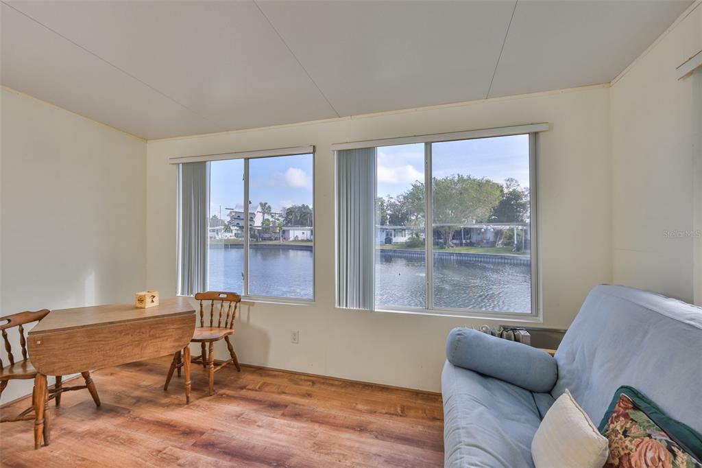 980 7th Street Northwest, Unit 16 Largo, FL 33770 - Photo 18 of 35 a living room with furniture and a large window