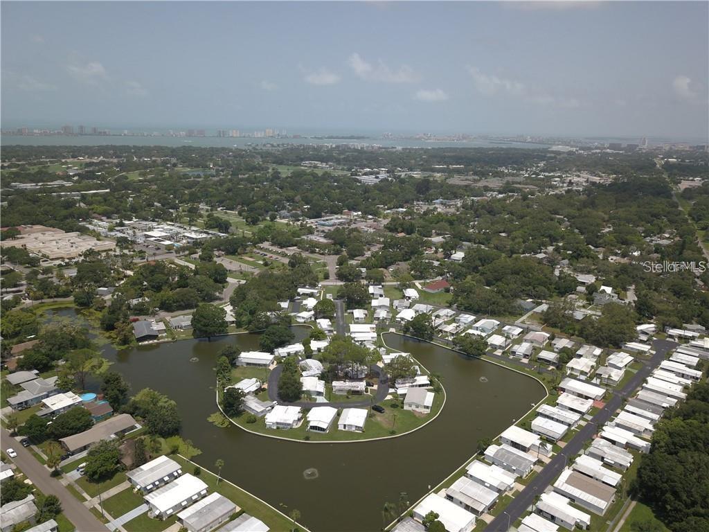 980 7th Street Northwest, Unit 16 Largo, FL 33770 - Photo 31 of 35 a view of a lake