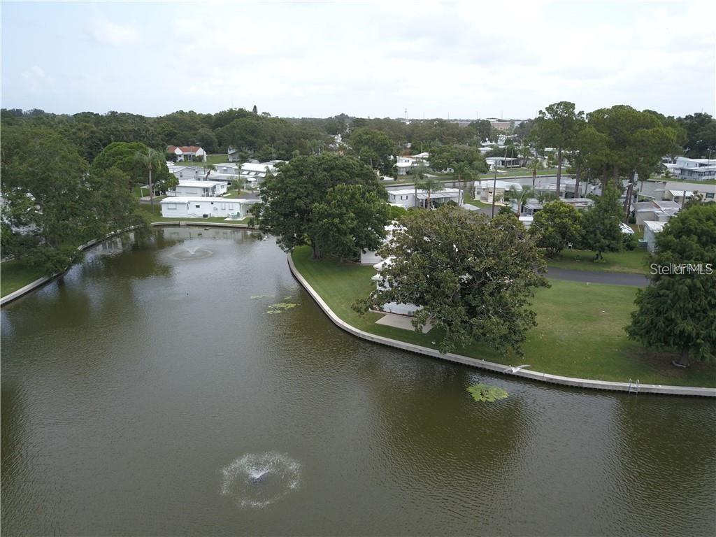 980 7th Street Northwest, Unit 16 Largo, FL 33770 - Photo 33 of 35 an aerial view of residential houses with outdoor space and river