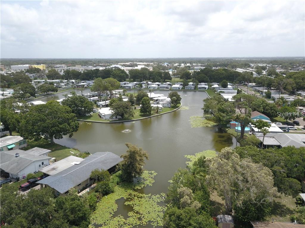 980 7th Street Northwest, Unit 16 Largo, FL 33770 - Photo 34 of 35 an aerial view of city and lake
