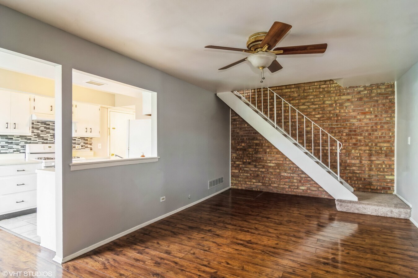329 David Court, Unit B Bartlett, IL 60103 - Photo 2 of 11 a view of entryway and hall with wooden floor