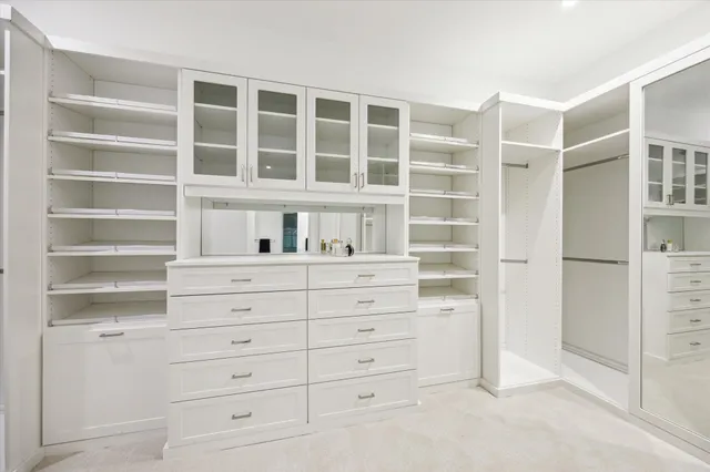 a bathroom with a sink vanity and a mirror
