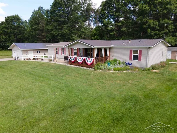 $359,900 | 2202 West Huckleberry Road, Sanford, MI 48657