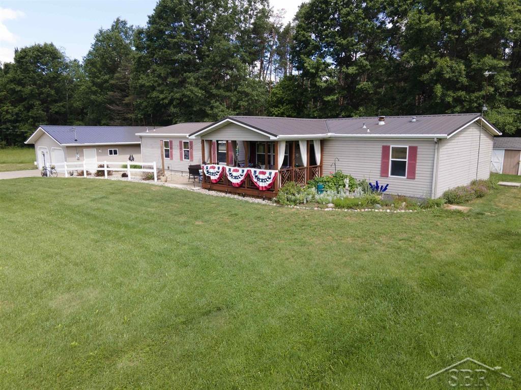 2202 West Huckleberry Road Sanford, MI 48657 - Photo 1 of 64