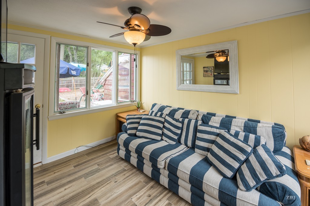 12 Surrey Road Salem, MA 01970 - Photo 5 of 15 a bedroom with a bed and wooden floor