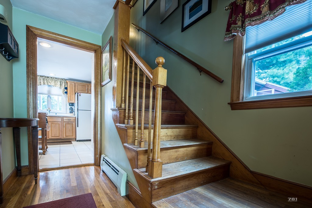 12 Surrey Road Salem, MA 01970 - Photo 10 of 15 a view of entryway and hall with wooden floor