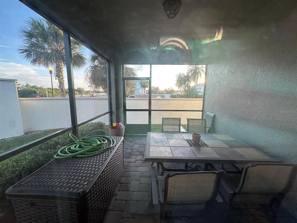 2101 Sunset Wind Loop Oldsmar, FL 34677 - Photo 12 of 13 a view of a dining room with furniture window and outside view