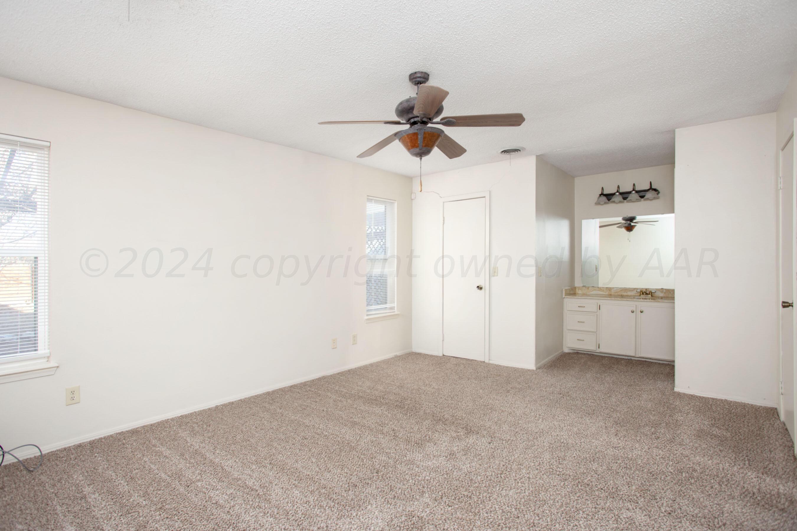 8328 Lamount Drive Amarillo, TX 79110 - Photo 12 of 24 a view of empty room with window