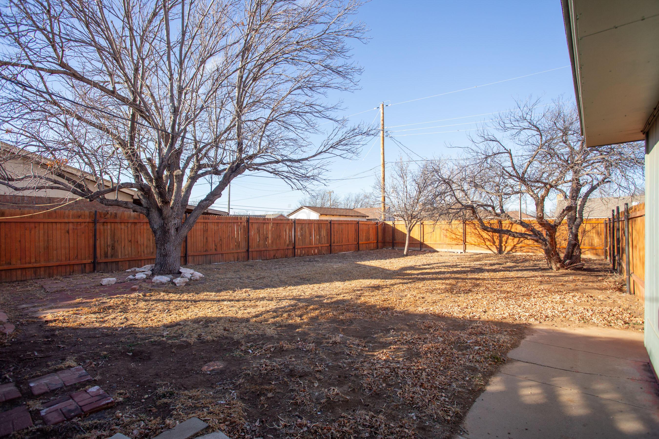 8328 Lamount Drive Amarillo, TX 79110 - Photo 22 of 24 a view of yard with trees