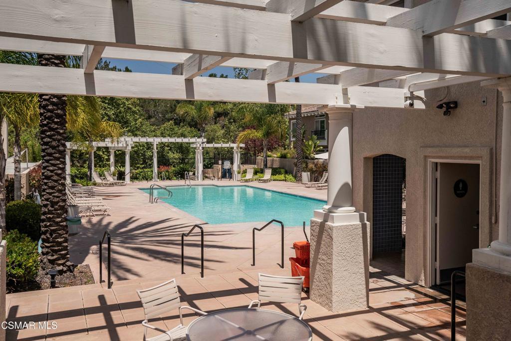 11529 Treeview Court Moorpark, CA 93021 - Photo 22 of 23 a view of a chairs and table in the house