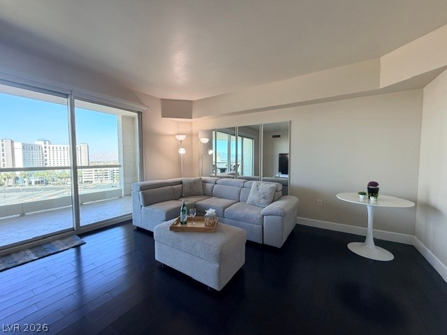 2777 Paradise Road, Unit 807 Las Vegas, NV 89109 - Photo 42 of 61 Floor-to-ceiling windows showcase views from this naturally illuminated living space.