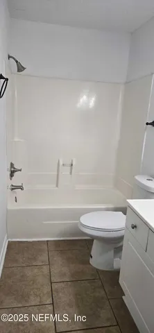 a view of a lake with a big yard