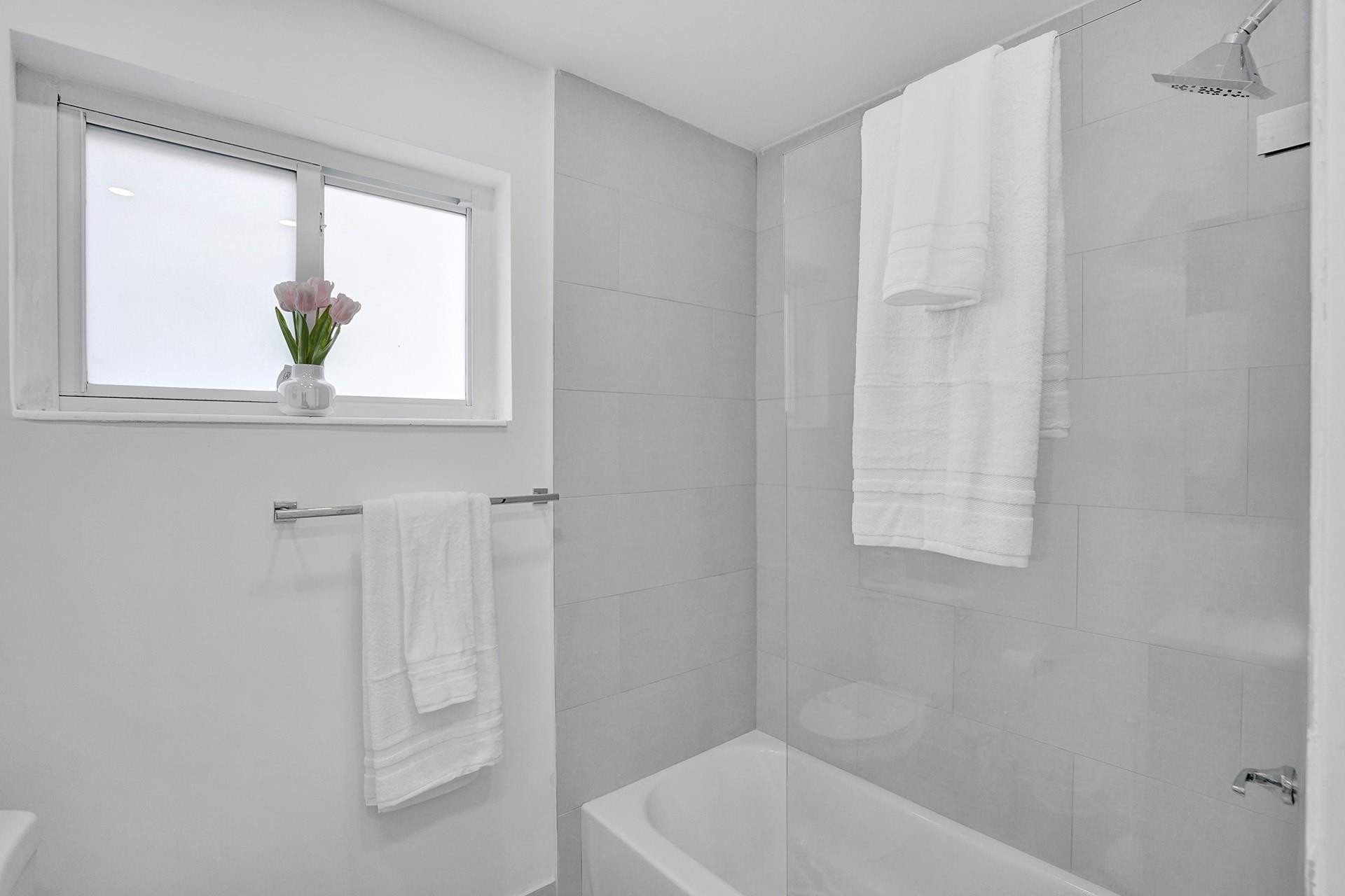 2114 North 42nd Avenue Hollywood, FL 33021 - Photo 17 of 24 a bathroom with a window