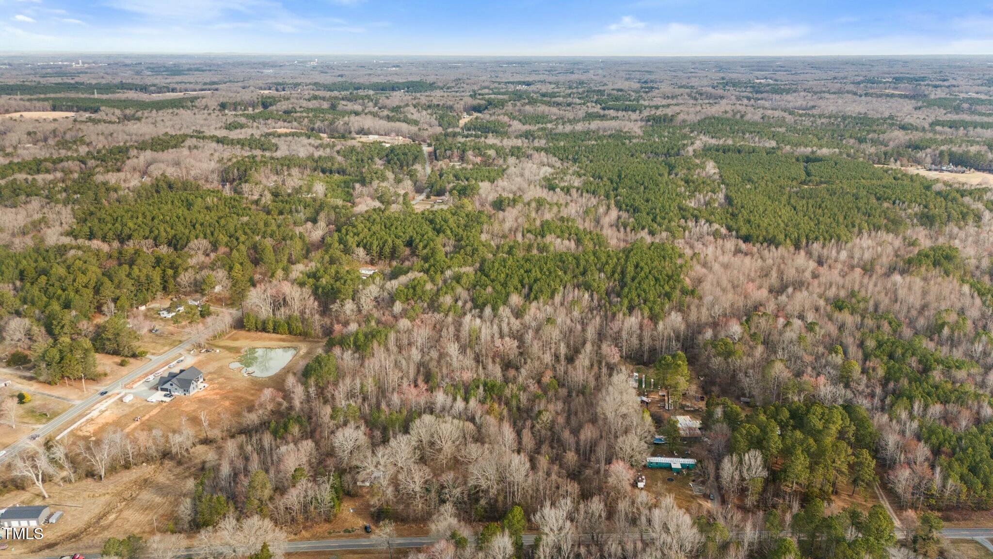 6621 Nicks Road Mebane, NC 27302 - Photo 2 of 10 a view of city and mountain