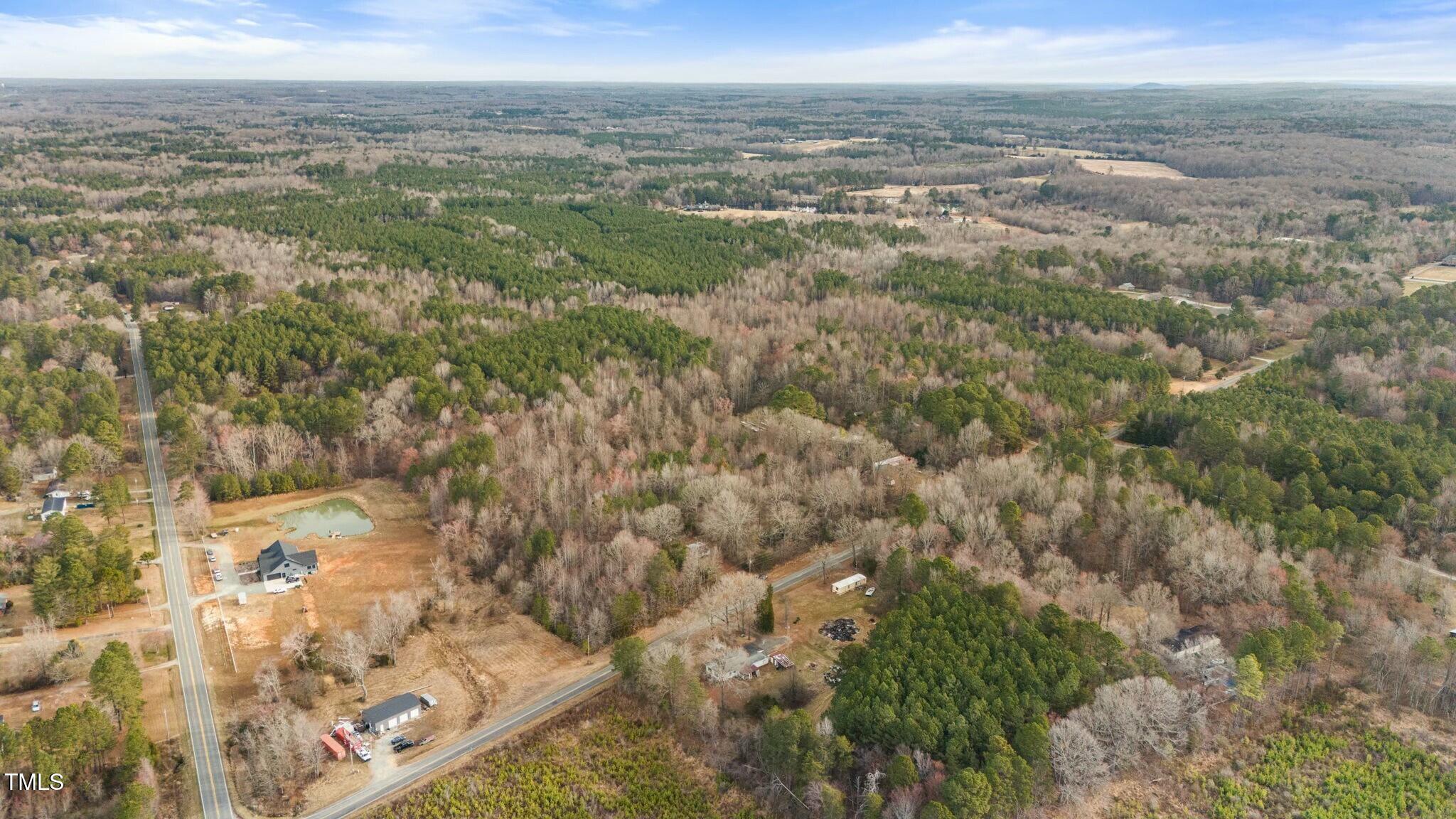 6621 Nicks Road Mebane, NC 27302 - Photo 3 of 10 a view of city and ocean
