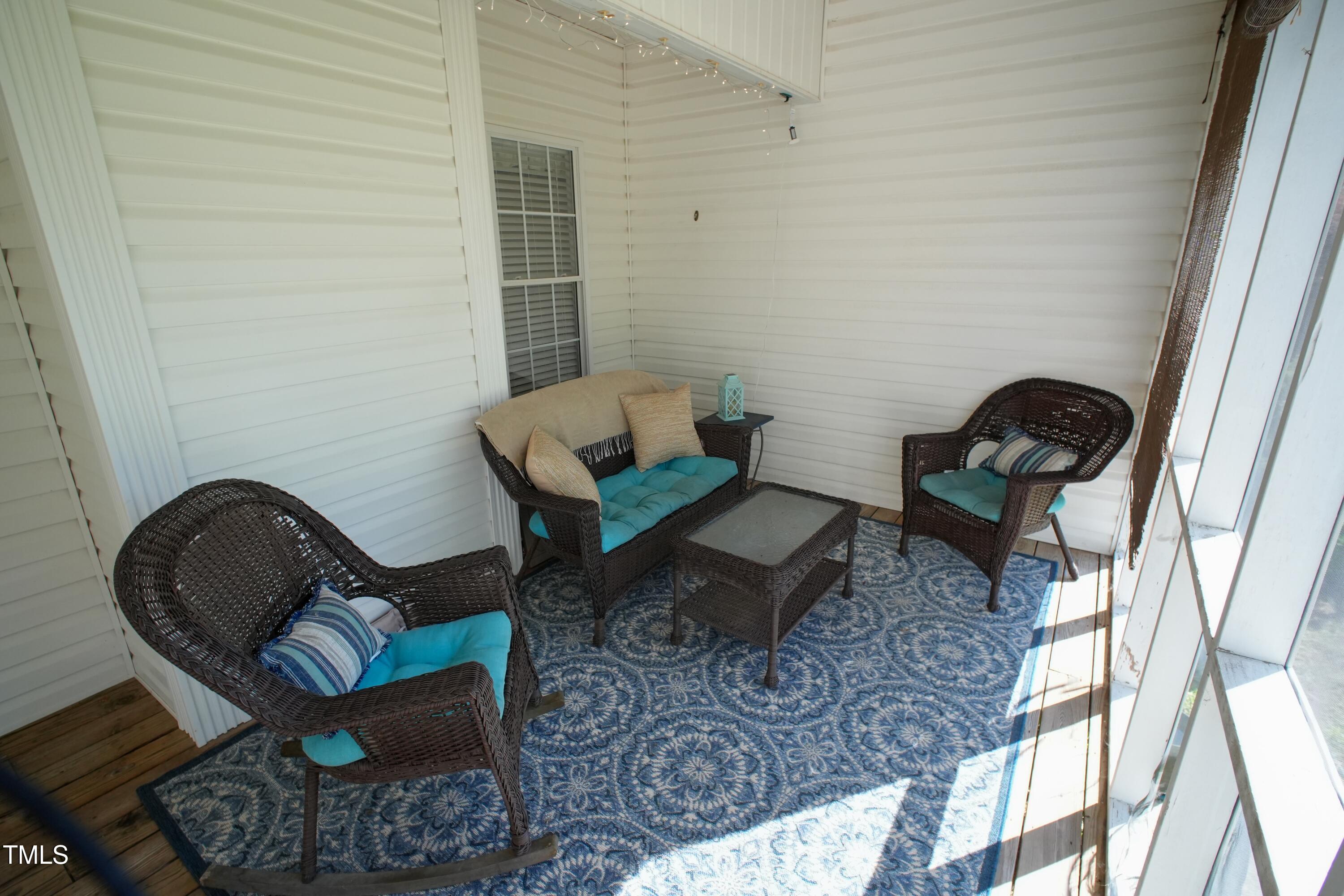 115 Hunters Walk Lane Clinton, NC 28328 - Photo 33 of 39 a living room with furniture and a rug