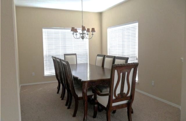 11112 Old Quarry Road Austin, TX 78717 - Photo 4 of 14 a view of a dining room with furniture window and outside view