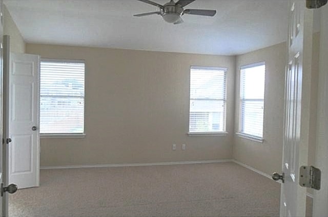 11112 Old Quarry Road Austin, TX 78717 - Photo 5 of 14 a view of an empty room with a window