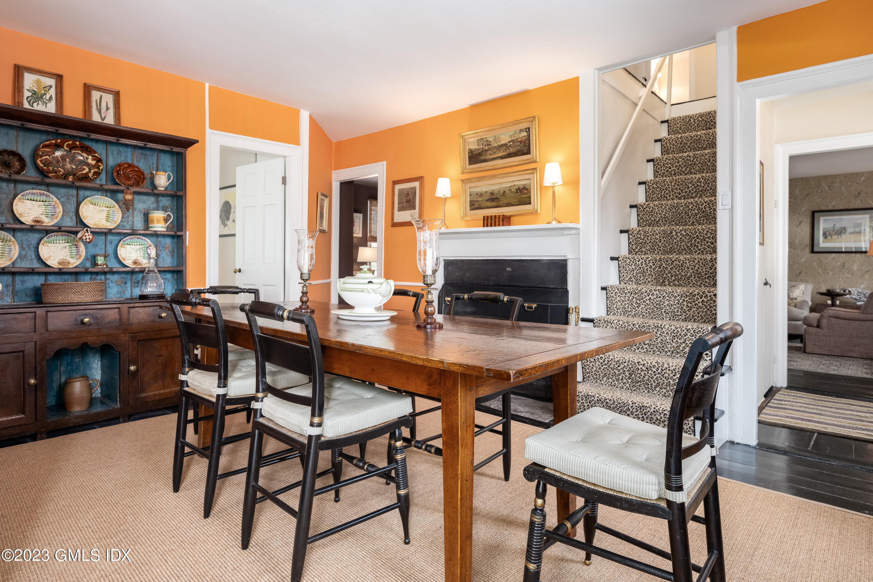 470 June Road Stamford, CT 06903 - Photo 20 of 26 a view of a dining room with furniture one side kitchen view and wooden floor