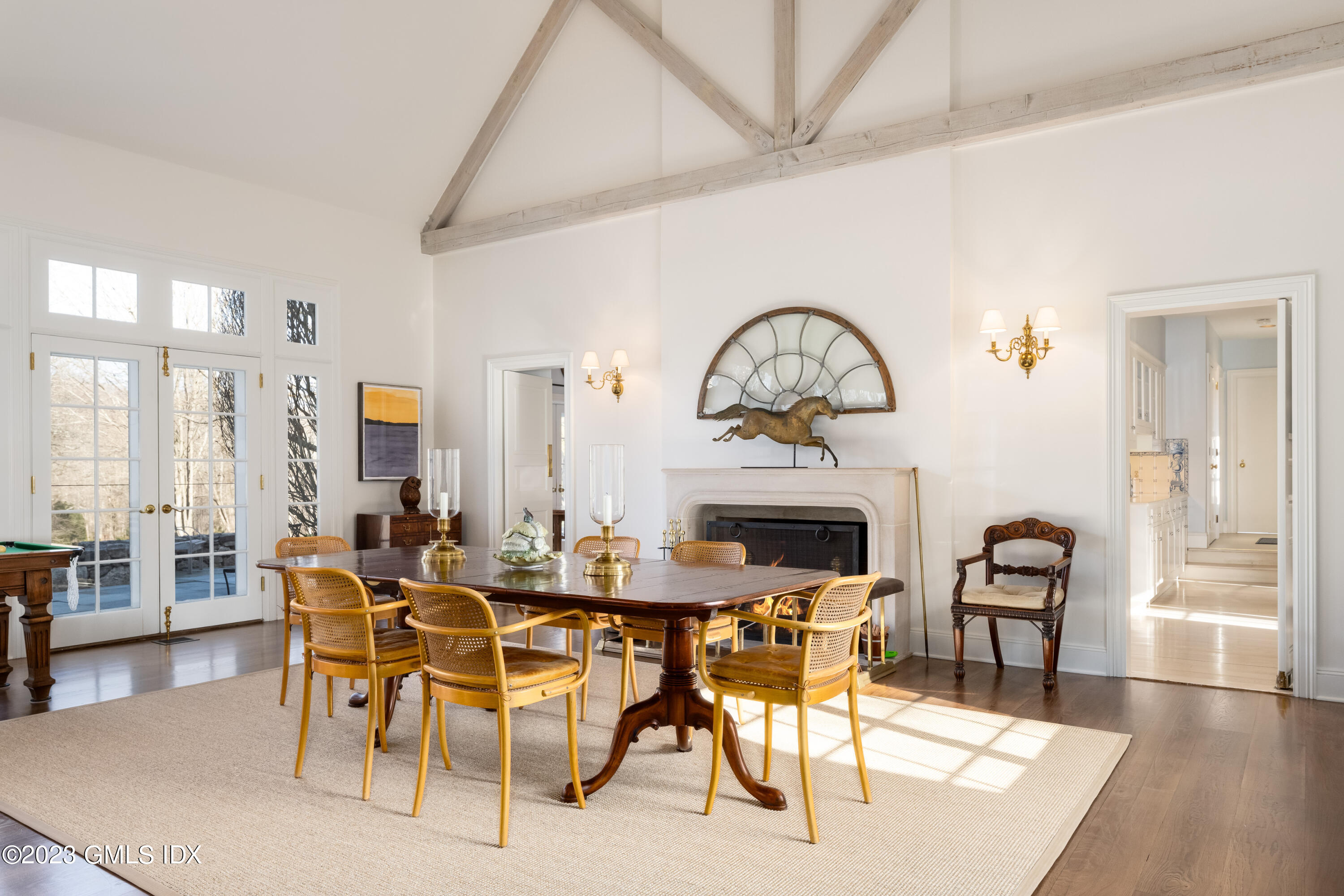 470 June Road Stamford, CT 06903 - Photo 6 of 26 a view of a dining room with furniture and wooden floor