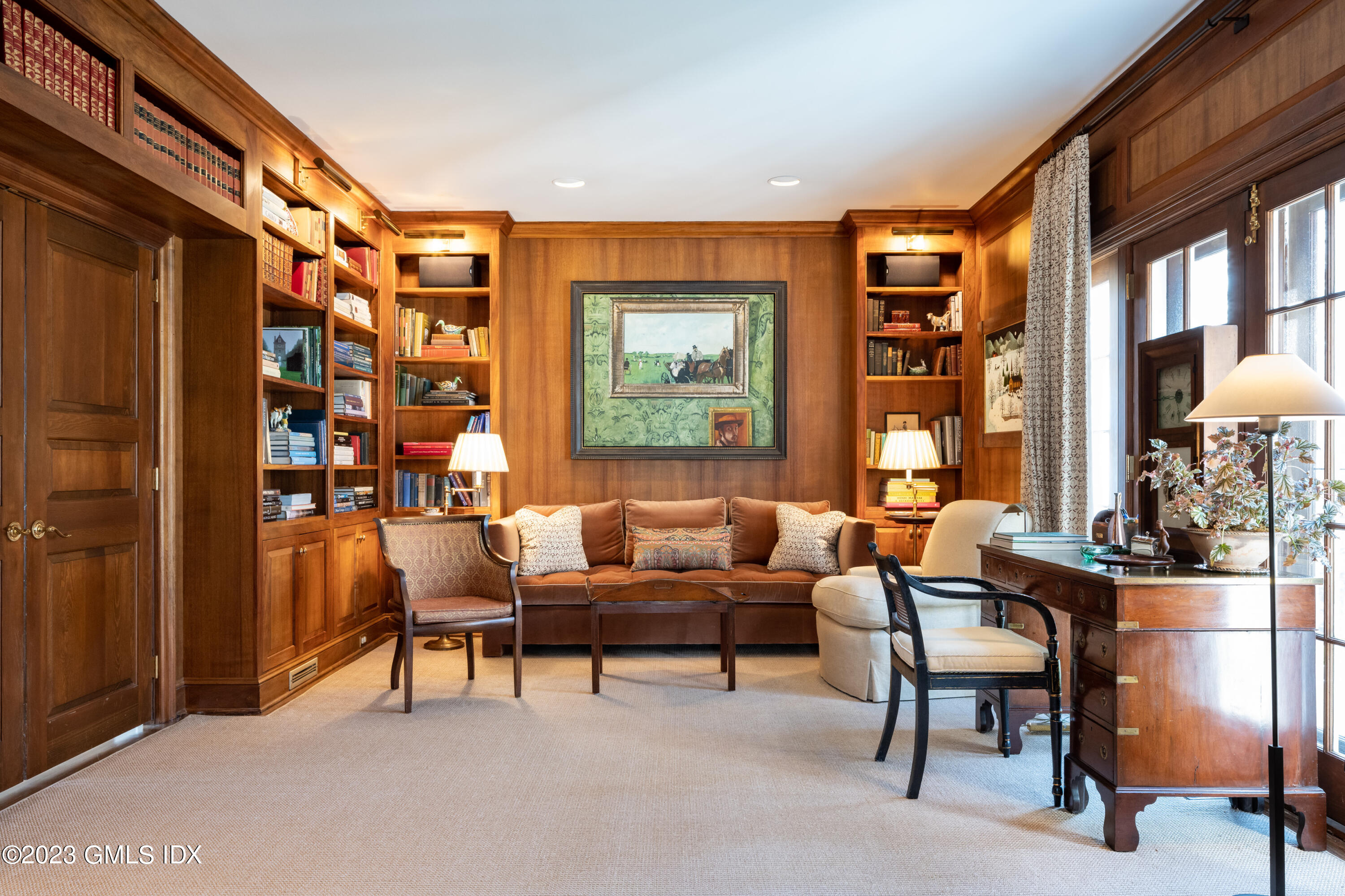 470 June Road Stamford, CT 06903 - Photo 7 of 26 a living room with furniture and a large window