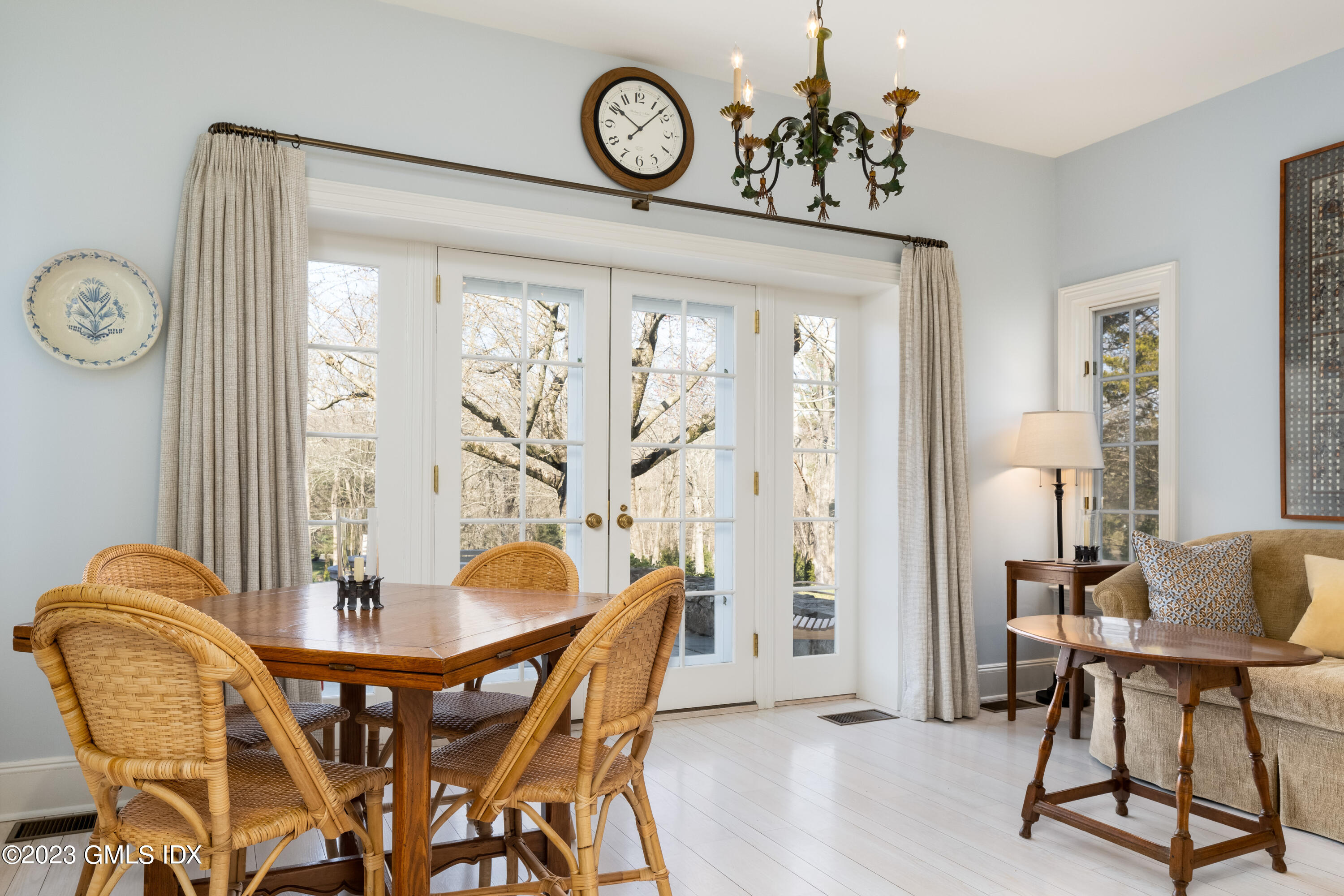 470 June Road Stamford, CT 06903 - Photo 9 of 26 a view of a dining room with furniture and a large window
