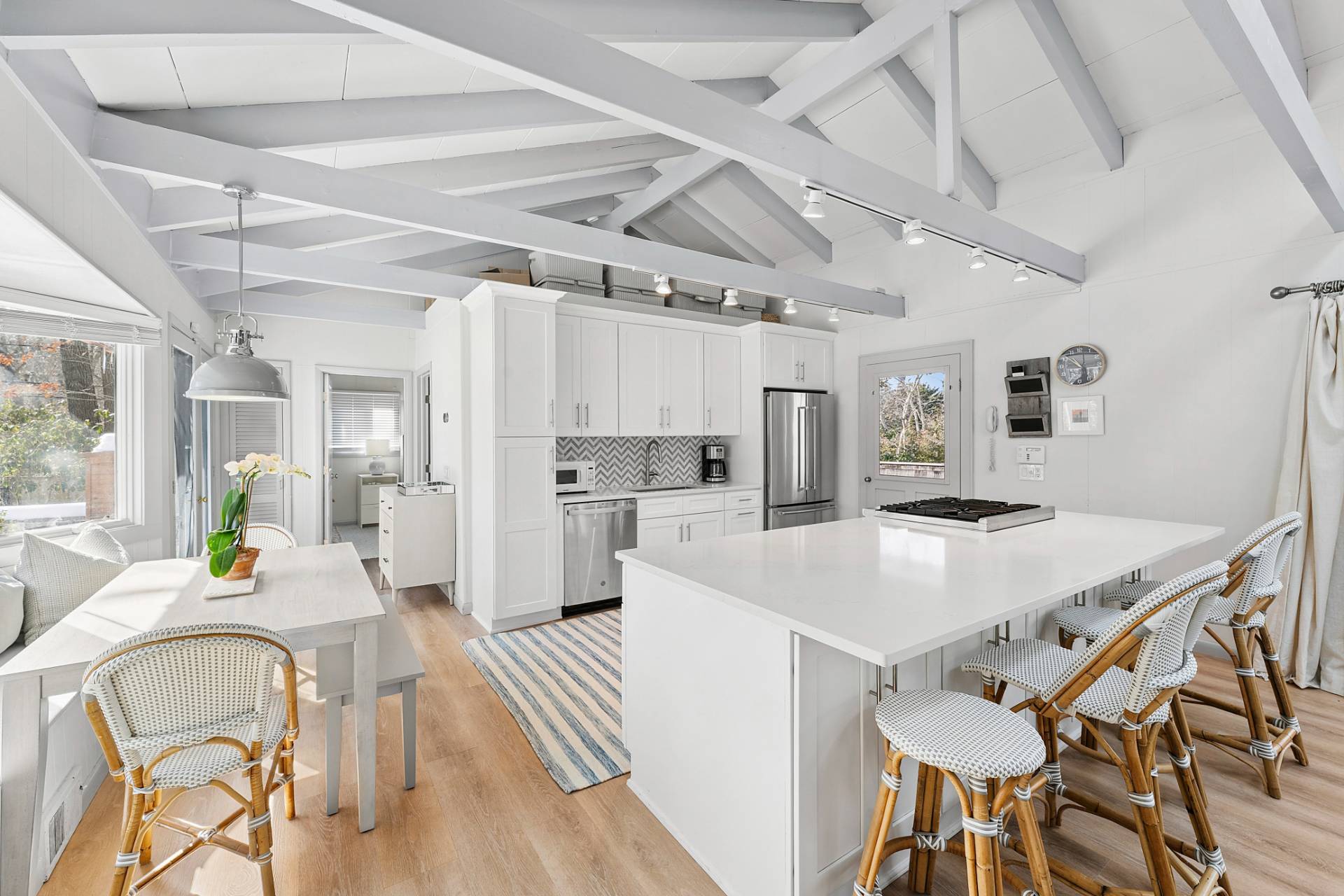 115 Isle Of Wight Road East Hampton, NY 11937 - Photo 2 of 14 a view of kitchen with cabinets table and chairs