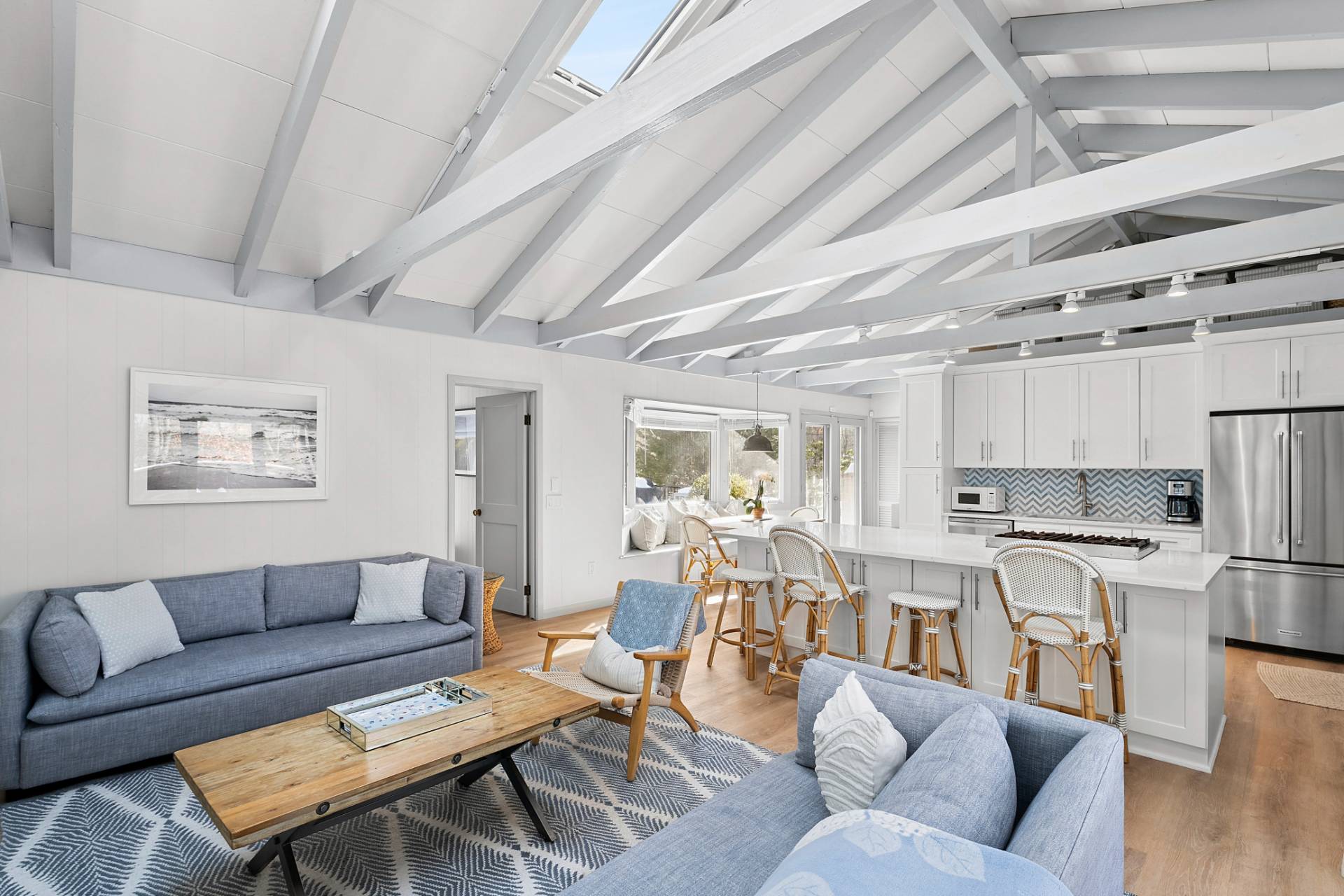115 Isle Of Wight Road East Hampton, NY 11937 - Photo 4 of 14 a living room with lots of furniture and white walls