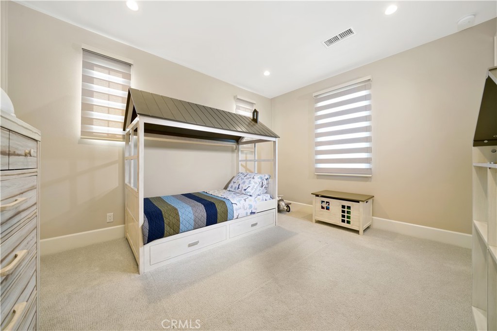 208 Villa Ridge Irvine, CA 92602 - Photo 2 of 46 a bedroom with a bed and a window