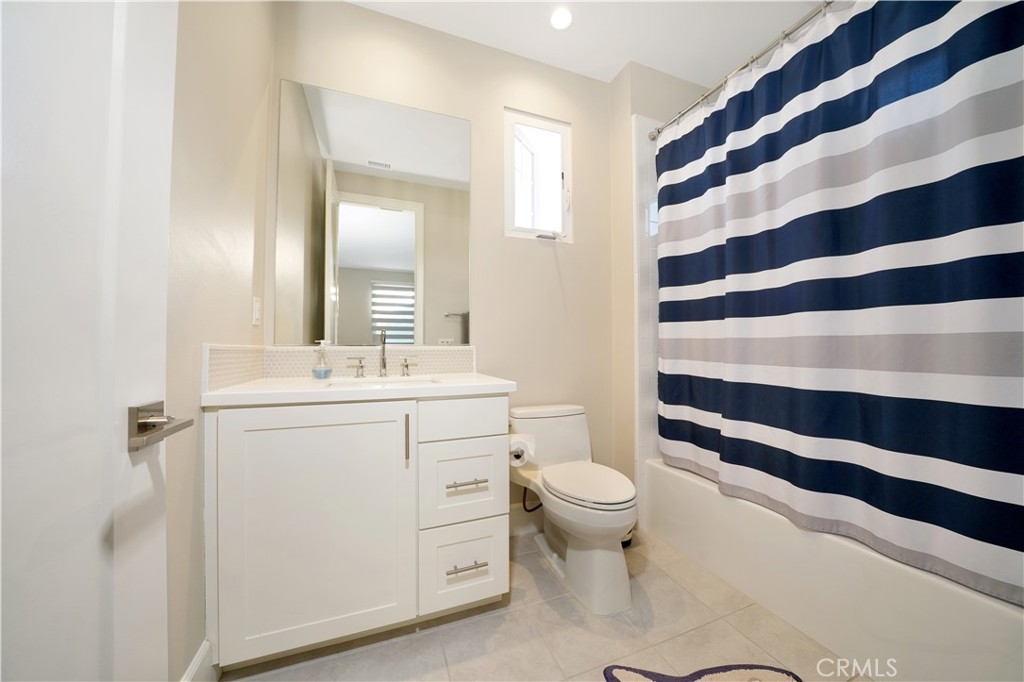 208 Villa Ridge Irvine, CA 92602 - Photo 40 of 46 a bathroom with a sink toilet and shower
