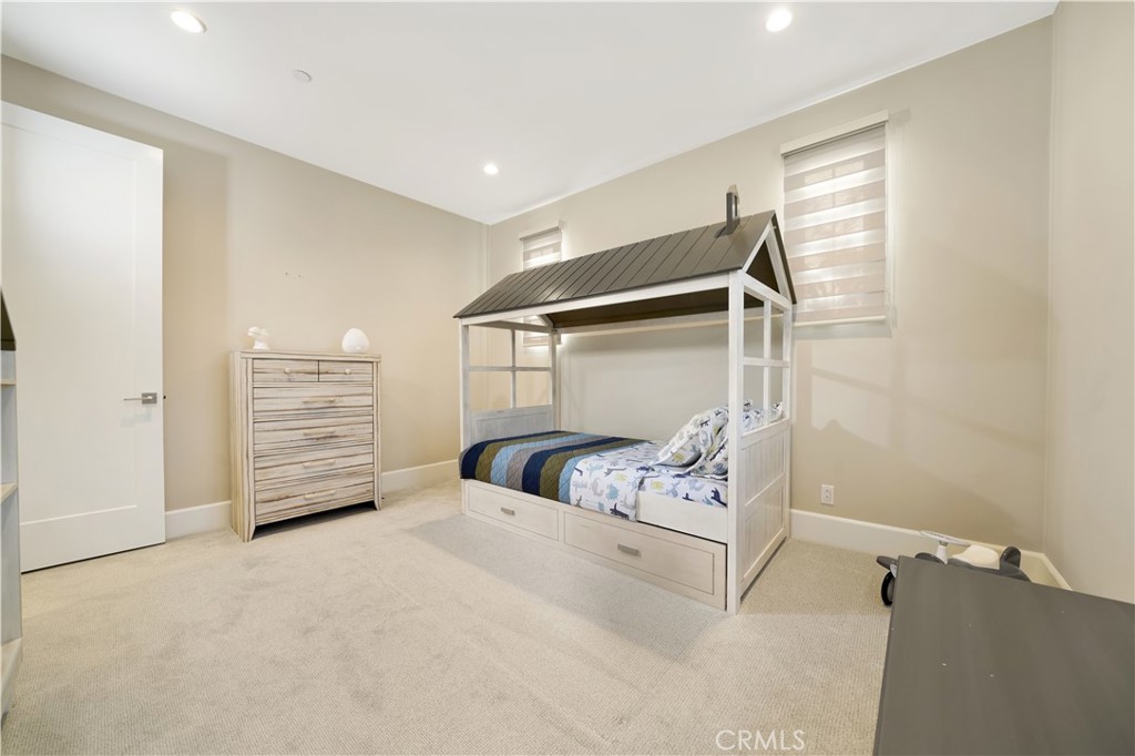 208 Villa Ridge Irvine, CA 92602 - Photo 42 of 46 a bedroom with a bed and a window