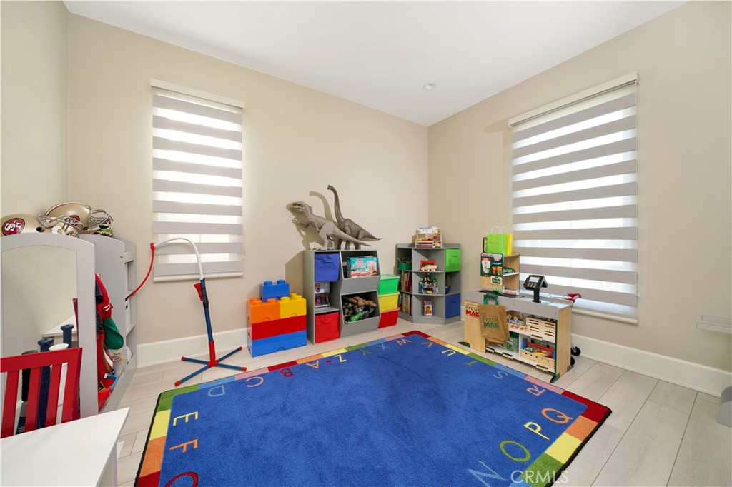 208 Villa Ridge Irvine, CA 92602 - Photo 9 of 46 a living room with furniture and a wooden floor