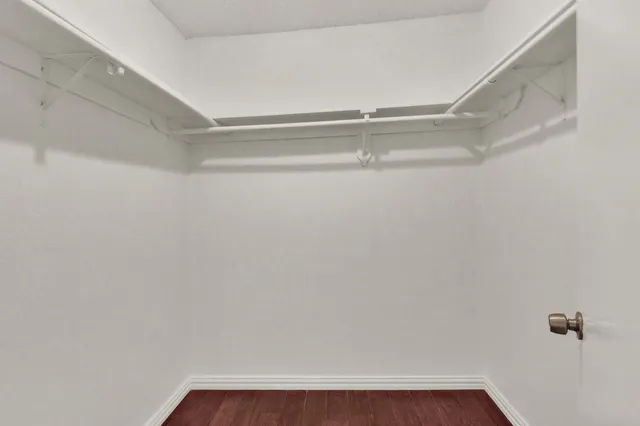 a view of a room with racks on the wall