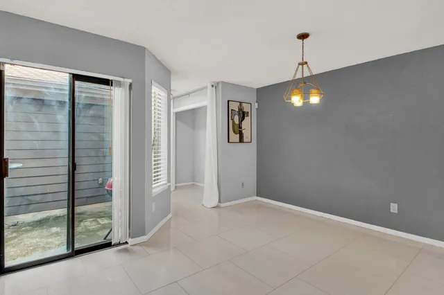 a view of an empty room with window