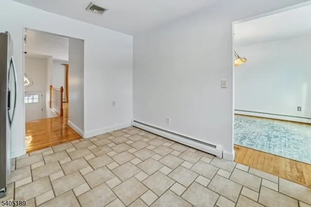 a view of a room & utility room