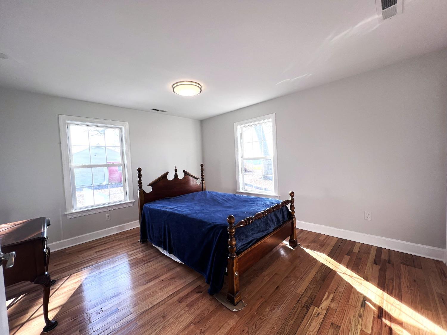 5235 Wards Fork Mill Road Cullen, VA 23934 - Photo 20 of 42 a living room with a bed furniture and a window