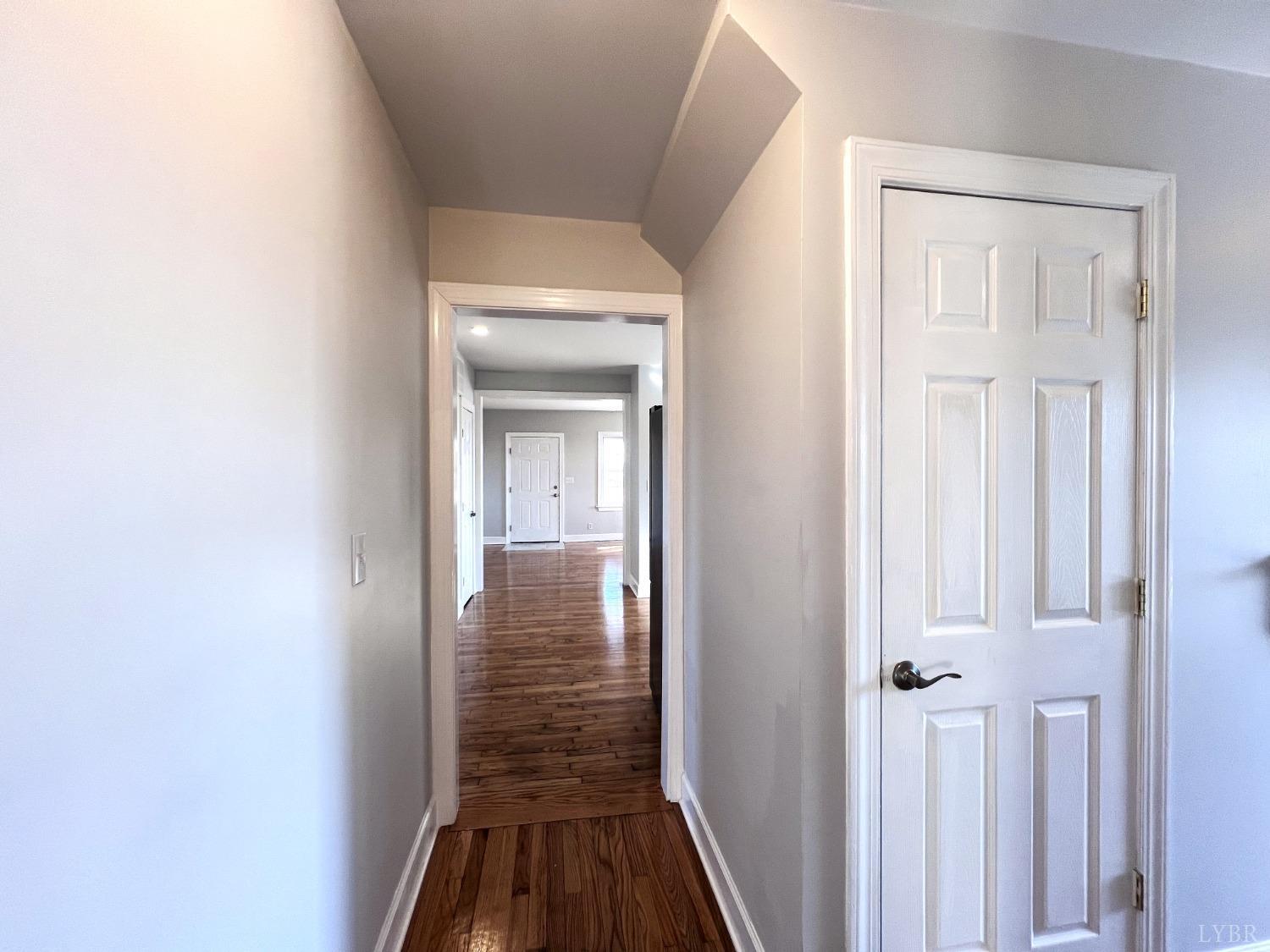 5235 Wards Fork Mill Road Cullen, VA 23934 - Photo 25 of 42 a view of a hallway with wooden floor