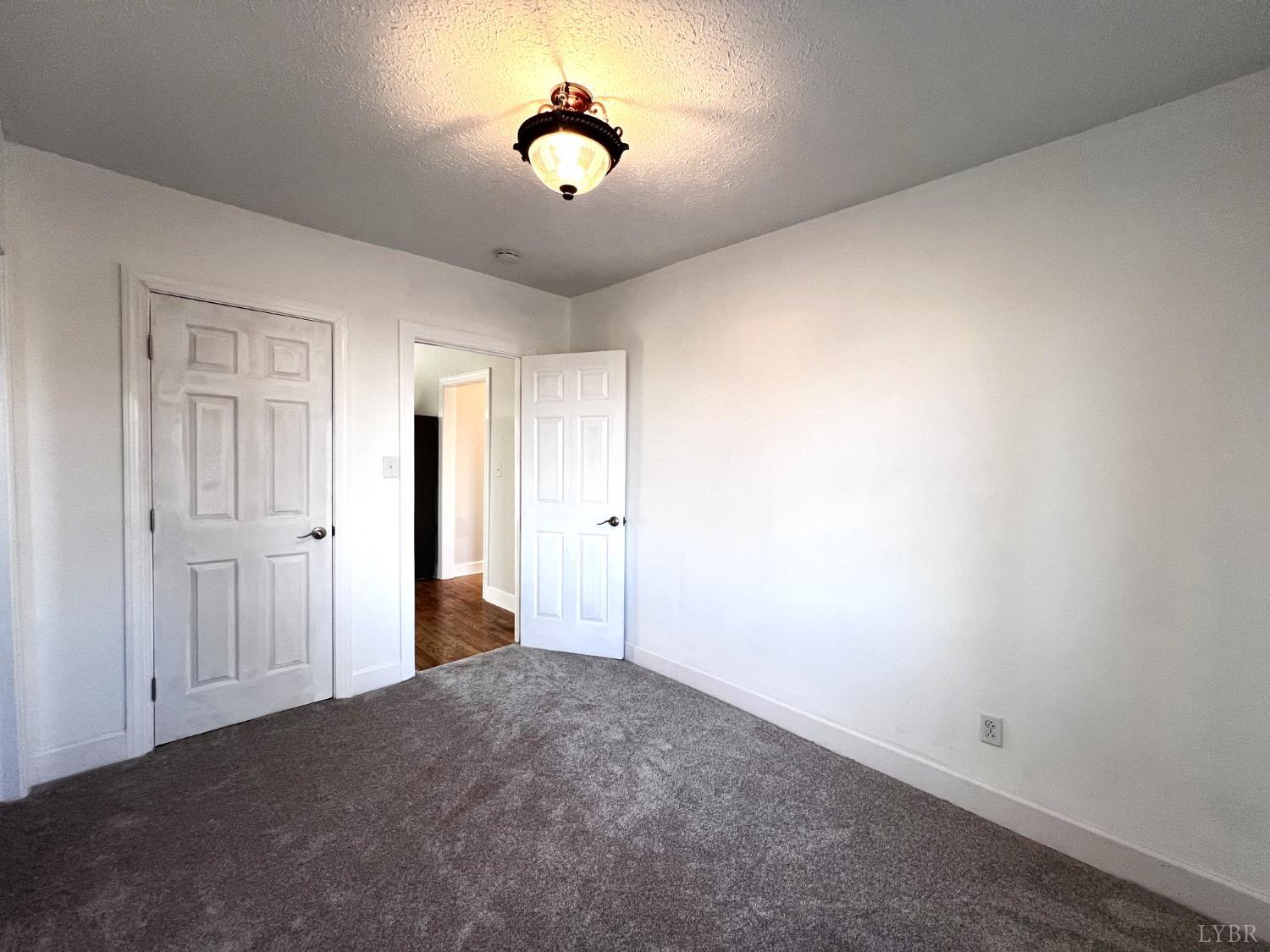 5235 Wards Fork Mill Road Cullen, VA 23934 - Photo 30 of 42 a view of room with chandelier fan