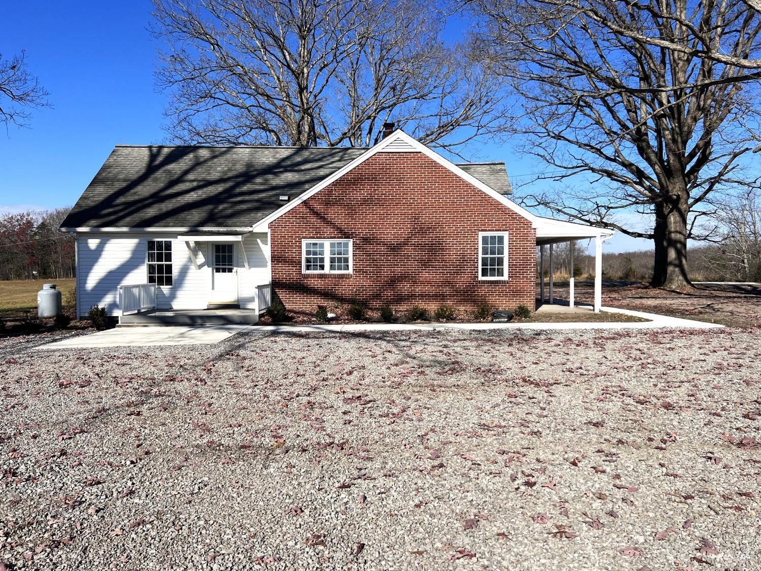 5235 Wards Fork Mill Road Cullen, VA 23934 - Photo 41 of 42 a front view of a house with garden