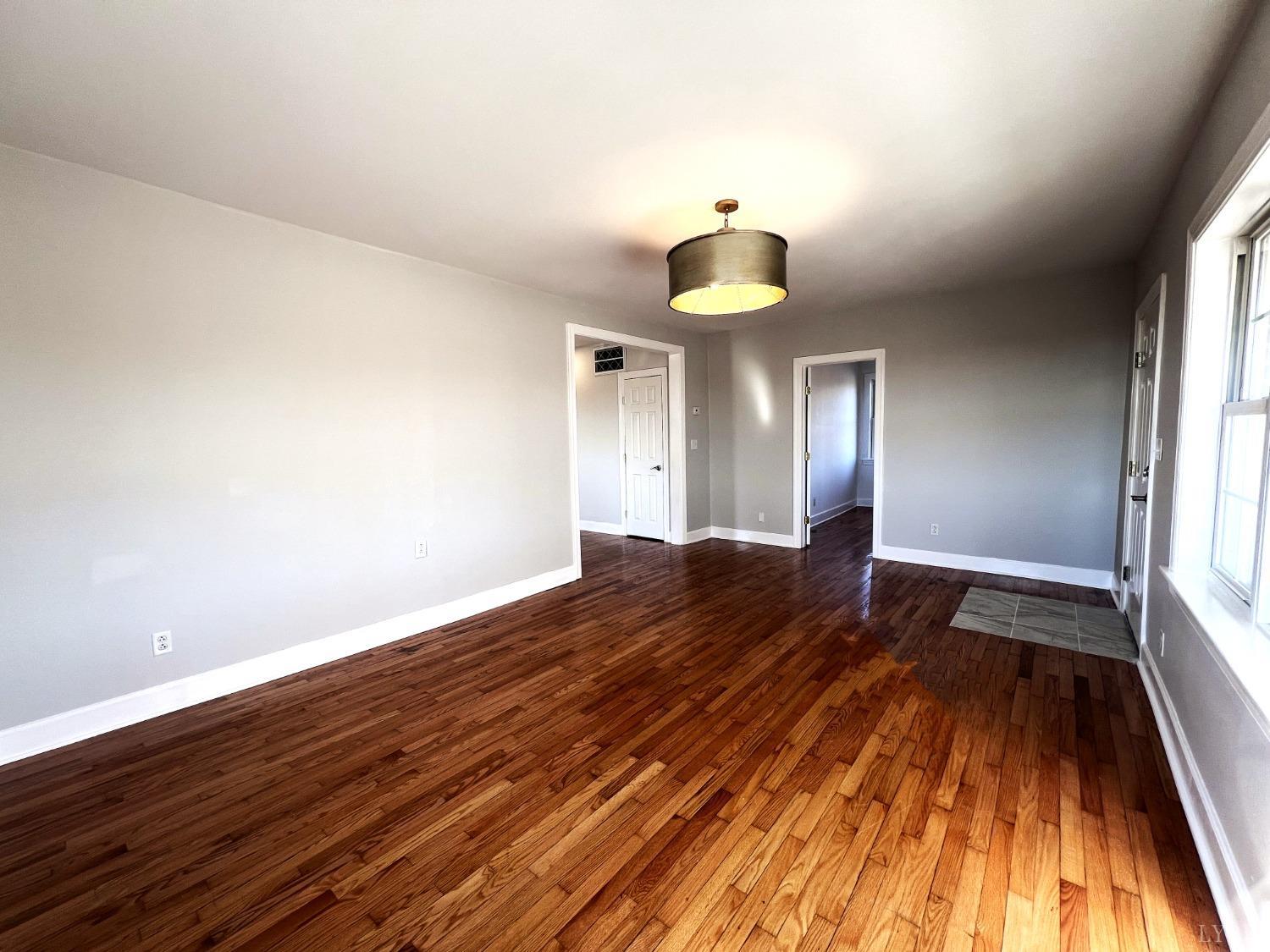 5235 Wards Fork Mill Road Cullen, VA 23934 - Photo 8 of 42 a view of empty room with wooden floor