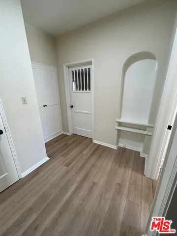 a kitchen with a sink cabinets and stainless steel appliances