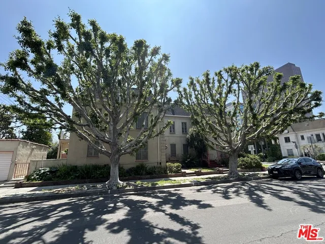 a view of street with houses