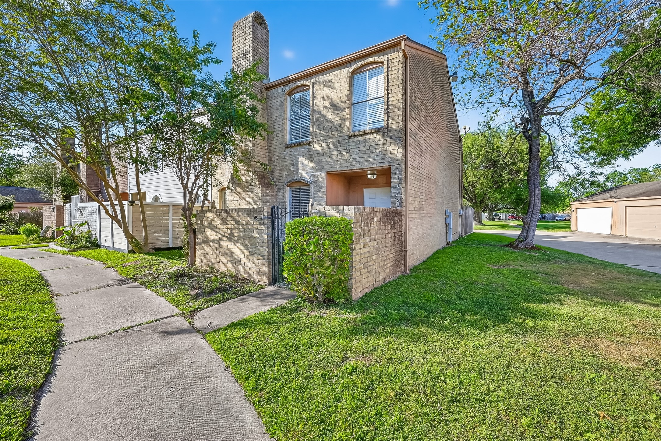 a view of a front of a house with a yard