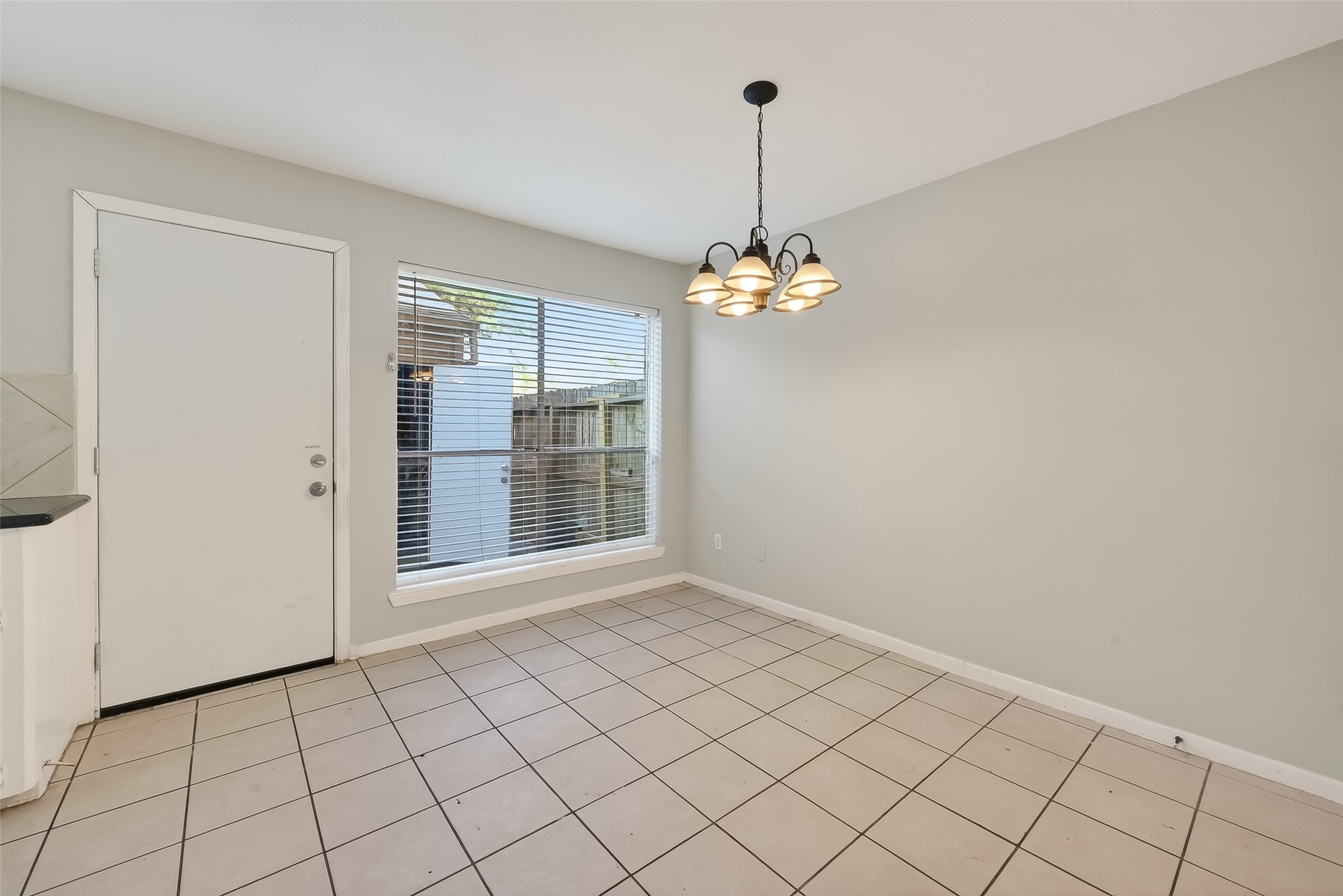 8646 Maplecrest Drive Houston, TX 77099 - Photo 12 of 36 a view of an empty room with a window