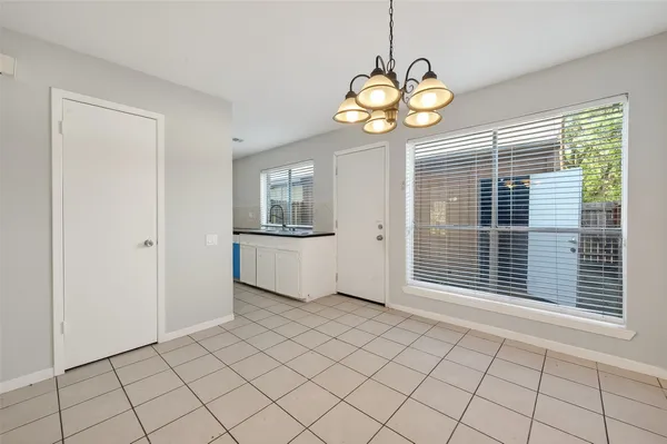 a view of a kitchen with a sink and dishwasher kitchen view