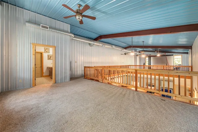 an aerial view of a house with a mountain view